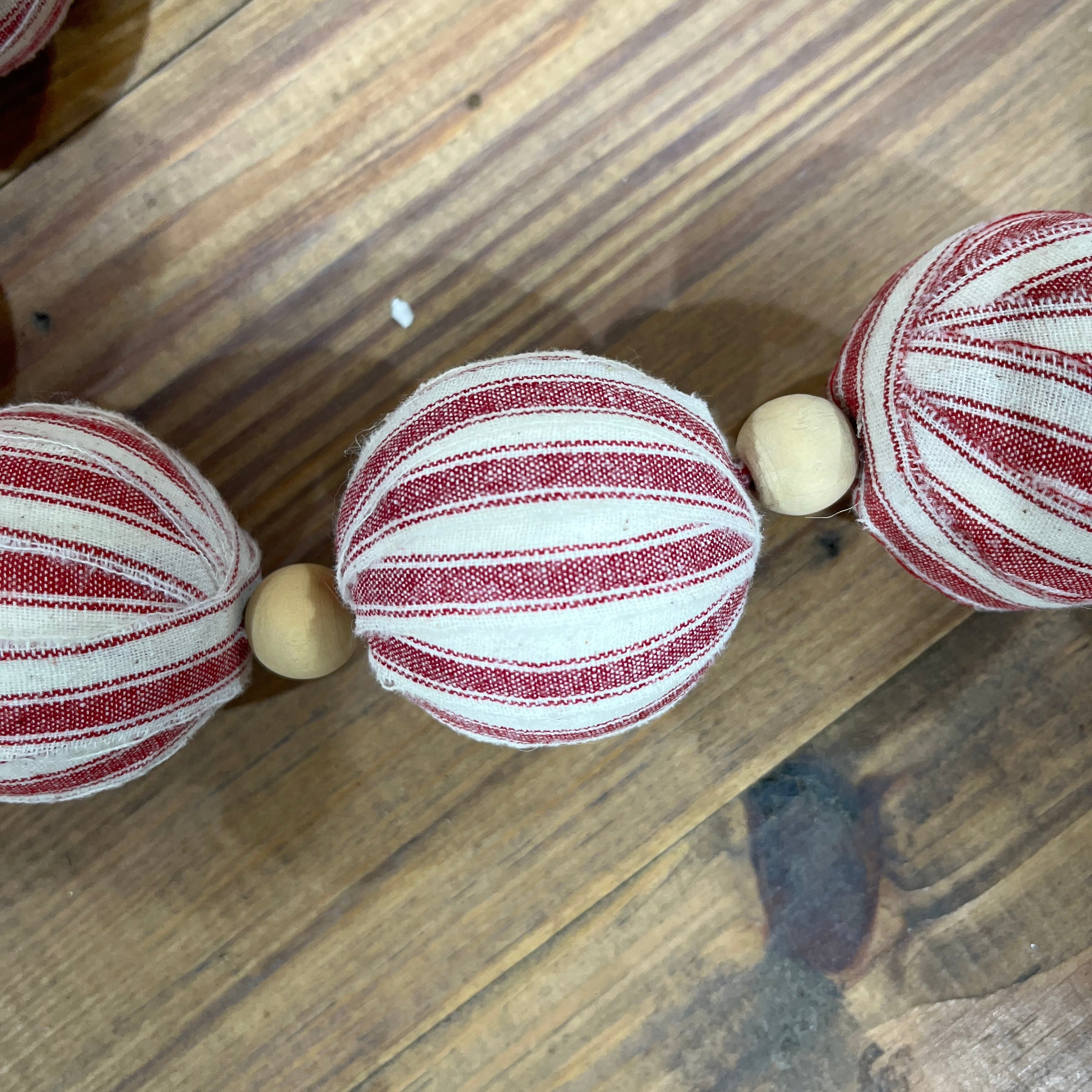 RED TICKING BALL GARLAND