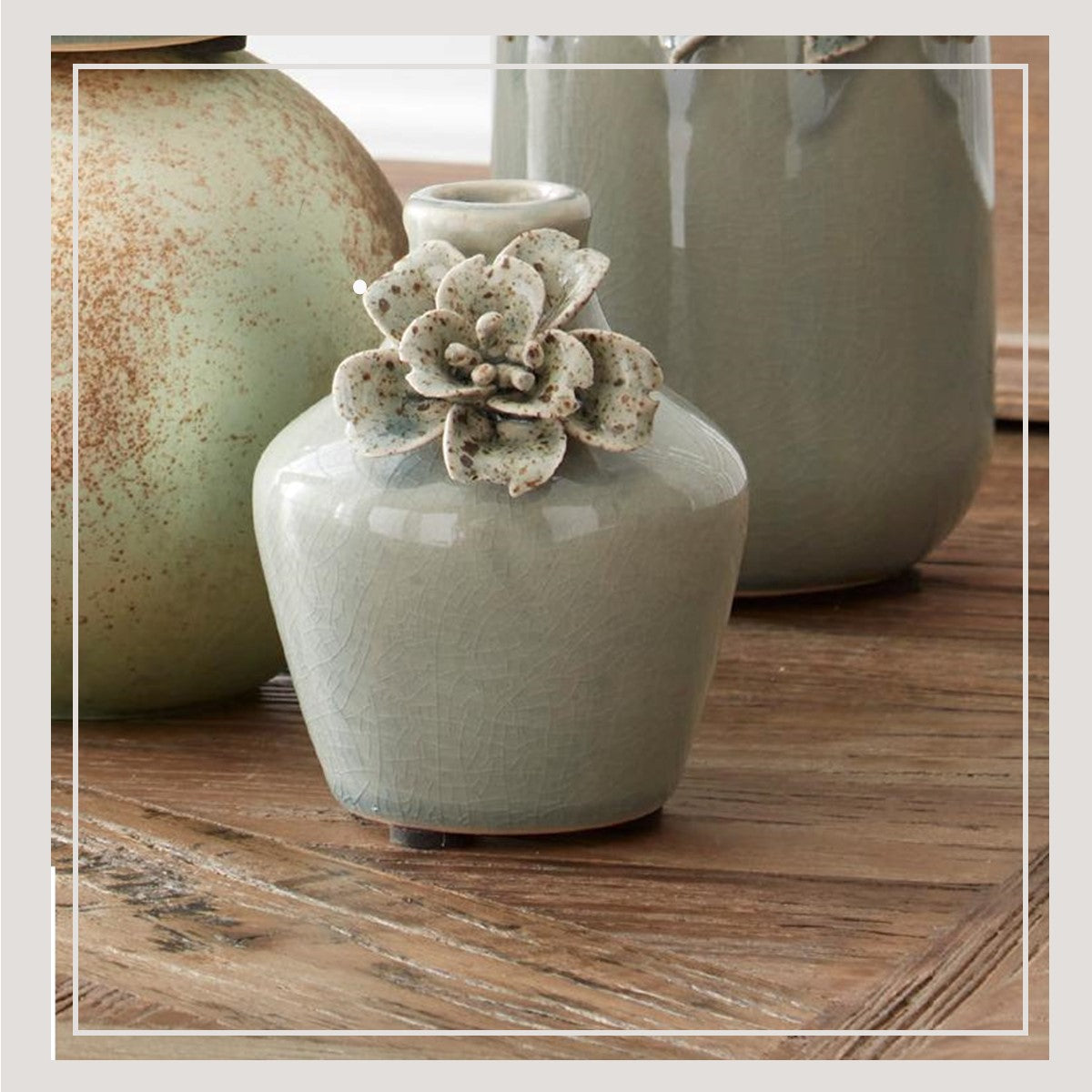 Light Blue Ceramic Vase w/Raised Flower (small)